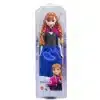 Disney Frozen Core Anna Frozen 1 - bewegliche Anna-Puppe in ihrem ikonischen Reisestil mit Umhang, Rock und Schuhen. Perfekt für Kinder ab 3 Jahren, um Frozen-Abenteuer nachzuspielen. 
