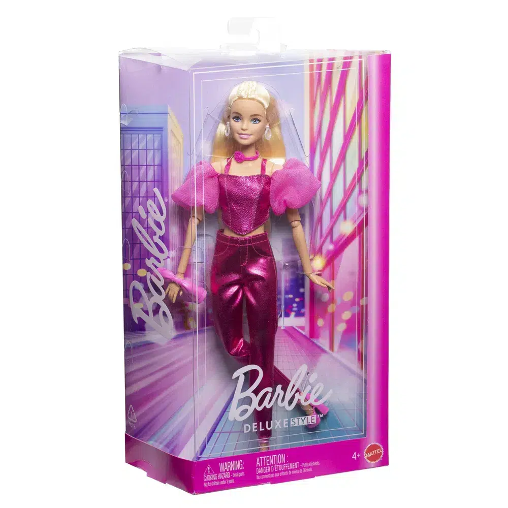 Barbie Deluxe Style Pink Set in two-piece pink set with braided bangs. Inspires play, fashion and creative self-expression.